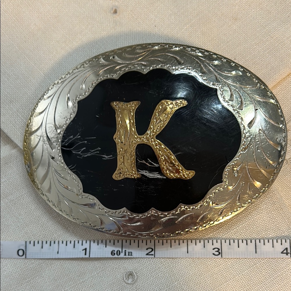 Silver and Black Belt Buckle with Gold Letter K